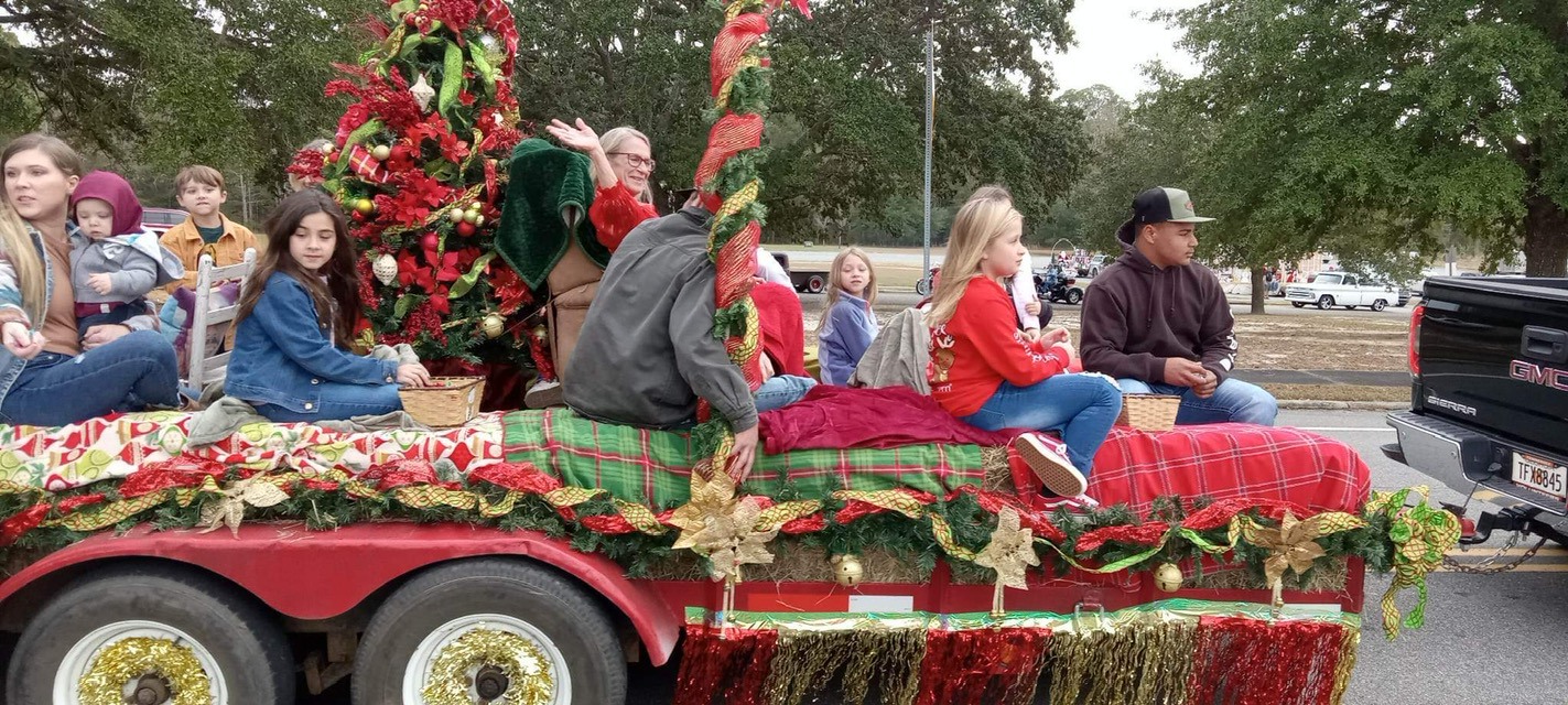 Johnnie Brooks in a parade car celebrating her status as Grand Marshall for the Treutlen County Christmas Parade